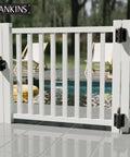 Heavy Duty Self Closing Gate Hinges With Adjustable Spring Tension on a white fence by the pool