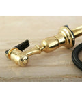 Kitchen Faucet Sprayer With Hose In Polished Brass, 60 Inch Grey Braided PVC Hose, on marble surface, side view