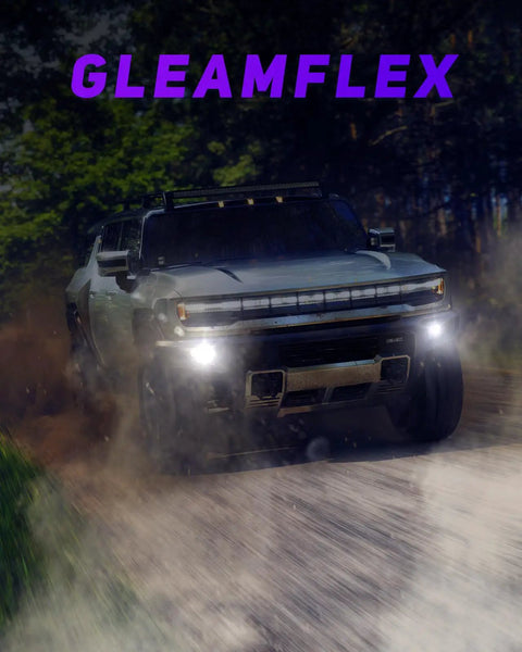 Kickass H11 H8 LED Fog Light Bulbs That Rip Through Fog And Blast 12000 Lumens Of Clean 6000K Cool White Illumination With Turbo Cooling And IP68 Waterproof Rating For Cars SUVs And Powersports Rides Pack Of Two in front of a powerful off-road vehicle.