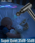 Quiet massage gun with heat head placed near sleeping baby, showcasing 35dB-55dB quiet operation for deep tissue muscle relief.