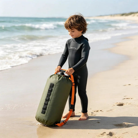 Child holding Do It All 3 In 1 Inflatable Water Weight Bag For Camping, Swim Float And Tent Anchor, 10L Green on beach