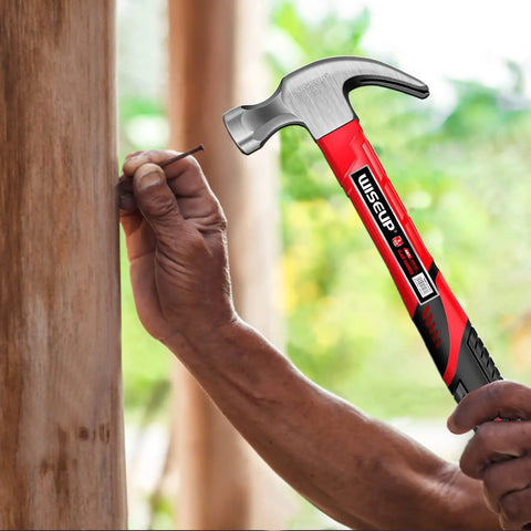 Person using an 8 oz hammer from Ultra Handy 560 Piece Nails And Hammer Set With 10ft Tape Measure for Picture Hanging and DIY Projects