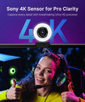 Woman giving thumbs up in front of a monitor showcasing the Crush Your Setup With This Top Tier 4K Webcam featuring Sony 4K sensor.
