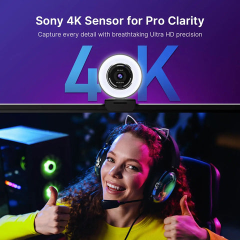Woman giving thumbs up in front of a monitor showcasing the Crush Your Setup With This Top Tier 4K Webcam featuring Sony 4K sensor.