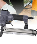 Heavy Duty Pneumatic Brad Nailer Dead Quiet Air Nail Gun With 100 Nail Capacity, angled view showcasing the jam release feature.