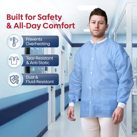 Model wearing blue Unisex Hip Length Lab Coat With Three Pockets, Soft Knit Cuffs And Collar, Disposable Medical Jacket, Hospital Hallway