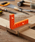 Lock Everything Down Dead Square With This 3 Inch Positioning Jig For Woodworking And Cabinet Assembly Makes Gluing Or Screwing No Sweat Captures Perfect Corners In Tricky Tight Spaces Super Handy For Quick Diy Projects In Bold Orange on wooden workpieces.