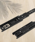 Eight Pairs Top Shelf Black Drawer Slides Full Extension Side Mount Ball Bearing Telescopic Slider Built Like A Tank Cabinet Hardware viewed from above on light wood.