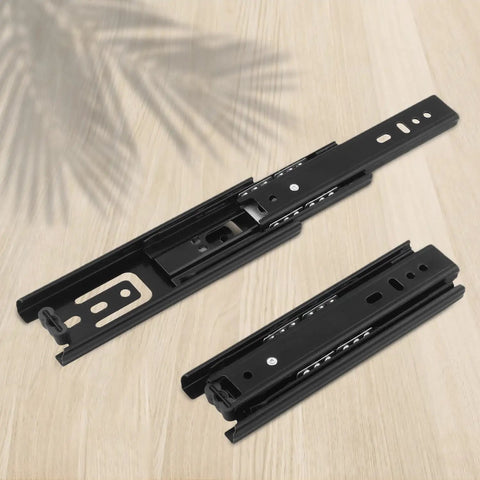 Eight Pairs Top Shelf Black Drawer Slides Full Extension Side Mount Ball Bearing Telescopic Slider Built Like A Tank Cabinet Hardware viewed from above on light wood.