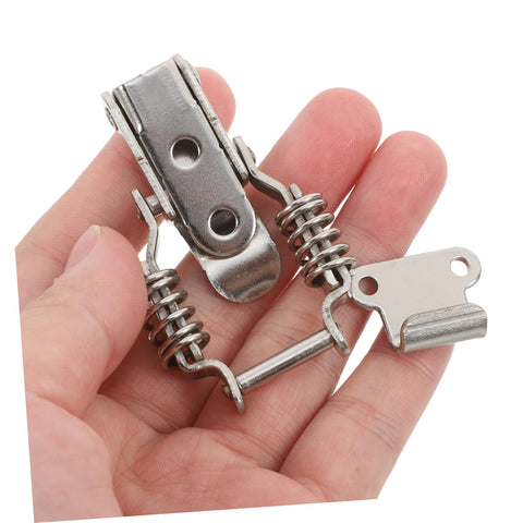 Industrial Draw Latch Clamp Set 4 Pieces Spring Loaded Latch Lid held in hand showcasing iron toggle hardware