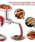 Metal meat grinder attachment for KitchenAid stand mixer; front view with grinding plates and sausage-stuffer tubes