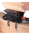 Heavy Duty 600W Electric Belt Sander With Variable Speed Control performing on wood surface with clamps holding it in place.