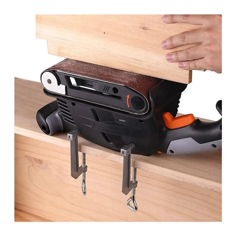 Heavy Duty 600W Electric Belt Sander With Variable Speed Control performing on wood surface with clamps holding it in place.