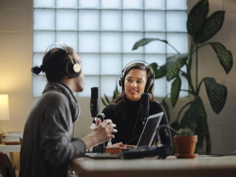 Affordable Two Thirds Inch Condenser Microphone For Clear Vocals And Instrument Tracking, XLR Output in home studio setup with people recording.