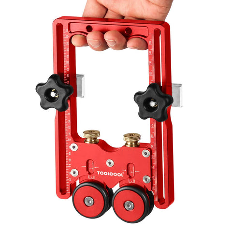 Pro Grade One Way Bearing Roller Featherboards for Table Saw with spring-loaded rollers, red aluminum alloy frame, hand-held view