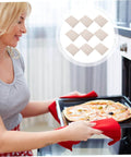 Woman using 10 Piece Mica Plates 150x120mm Microwave Heat Insulation And Fireproof Sheets in oven with pizza