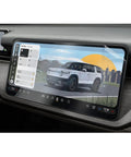 Laser Precision 15.6 Inch Screen Protector Fits 2027 Rivian R2 Trims Exactly displaying a touchscreen with navigation features.
