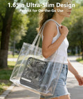 Woman carrying Ultra Thin 7 Inch Portable Travel Fan Must Have With 8000mAh Battery in a clear bag, ideal for outdoor use.