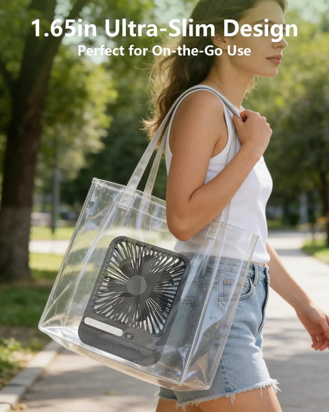 Woman carrying Ultra Thin 7 Inch Portable Travel Fan Must Have With 8000mAh Battery in a clear bag, ideal for outdoor use.