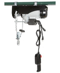 Strongway 1100 Lb Electric Cable Hoist With 2200 Lb Double Line Capacity For Garage Use Features motor, remote, and hoist chain visible.