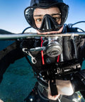 Scuba diver using Beast-Mode 15000 Lumen Scuba Dive Light With Type-C Rechargeable, Six XHP50 LEDs and IPX8 Waterproof in water.