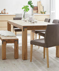 Dining set featuring wooden table and chairs using Flat L Brackets For Wood 120x120mm Stainless Steel Corner Braces Durable Matte Black Finish.