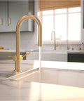 hansgrohe Talis N Pull Down Kitchen Faucet, Modern, Magnetic Hand Sprayer, 1-Handle, 1.75 GPM, Brushed Bronze stream of water
