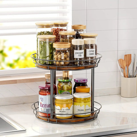 10 Inch Lazy Susan Turntable Organizer 2 Tier Round Rotating Spice Rack with glass jars on a kitchen countertop