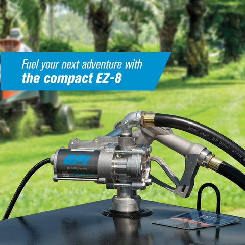 Heavy Duty 8 GPM Electric Fuel Transfer Pump With Spin Collar And Manual Shut Off Nozzle For Gasoline And Diesel 12 Volt on tank outdoors.