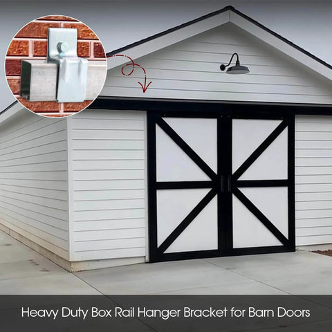 Exterior barn with heavy duty exterior barn door hanger brackets for box track system, galvanized steel, supporting doors.