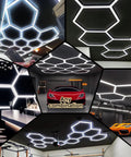 Hexagon LED Garage Lights Kit Pro Grade With 69 Pack Tubes illuminating car garages and detailing workspaces.