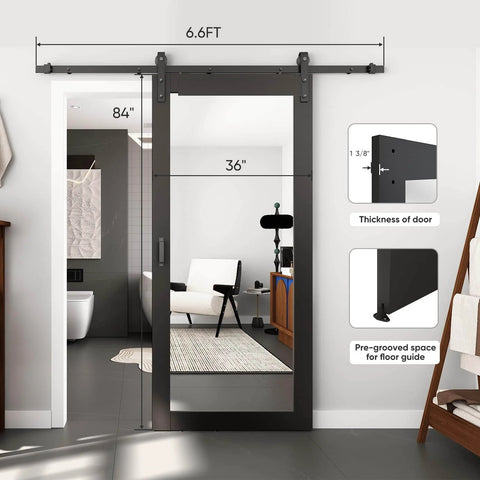 Image showing 36 Inch Wide By 84 Inch Tall Mirror Barn Door Built Tough With 6.6 Foot Sliding Hardware Kit Included One Lite Full Length Glass Solid Wood Waterproof PVC Surface Scratch Resistant No Assembly Required Black installed in modern bathroom.