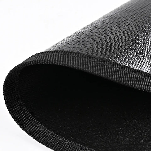 Close-up of Rugged Waterproof Silicone Fire Mat 36x36 Inch with Dual Layer Thermal Barrier, textured surface visible.