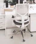 Office Chair Caster Wheel Zinc Alloy Swivel Wheel with Brake, 4pcs on a modern white office chair in a bright workspace.