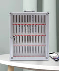 Heavy Duty Cell Phone Locker For Classrooms 48 Slot Portable Storage Cabinet with key latch and aluminum alloy design on a table.