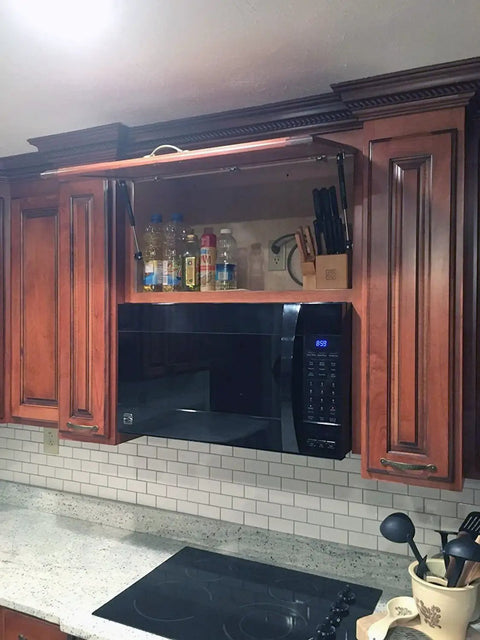 Open kitchen cabinet with 100N 22.5lb gas struts 10 inch lift supports set of 4 for lids and doors above microwave