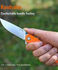 Person holding Your Go To Everyday Carry Folding Pocket Knife With 3.39 Inch 14C28N Blade, G10 Handle, Deep Carry Clip in hand