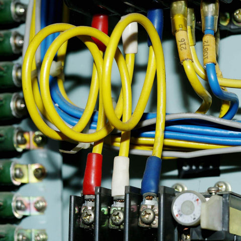 Installed Dual Row 3 Position Wire Barrier Block Terminal Strip 600V 100A with clear cover and wires in electrical panel