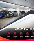 Black 8ft LED Shop Light, 100W 12500lm, 5000K Daylight in parking garage, dual mount surface or suspension use