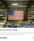 American flag in manufacturing facility highlighting 'You Can Count on Dayton' stainless steel sinks made in USA.