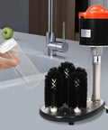 No Sweat Electric Commercial Glass Washer Cranks Out Eight Hundred Cups Per Hour Reliable Five Brush System displaying brushes and vessel by sink