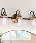 Modern 3 Light Seeded Glass Vanity Light Fixture In Matte Black And Brushed Brass Finish With A Circular Backplate And Three Arched Arms Ideal For Master Bathrooms Or Powder Rooms Spruces Up Your Bathroom With A Dope Mid Century Modern Vibe