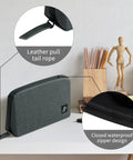 Must Have Electronic Organizer Travel Case Water Resistant Cable Bag For Cords, Chargers, Hard Drives, Power Banks And Small Tech Essentials Great For Travel Backpack Business Trip And Airplane showing leather pull tail rope and closed waterproof zipper design