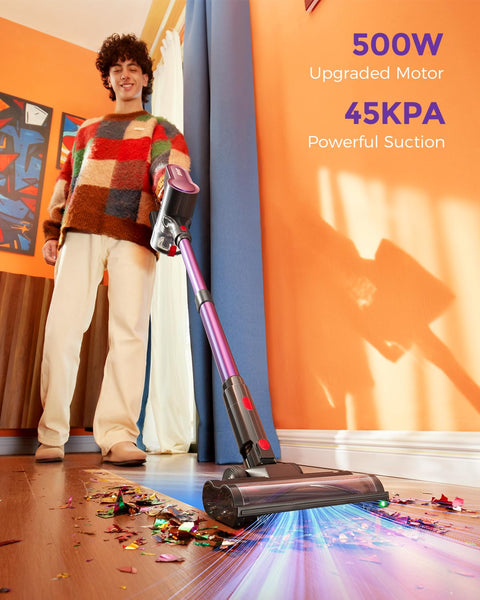 Person using cordless vacuum cleaner with 500W motor and 45KPa suction, self standing stick vacuum for home, LED light on hard floor