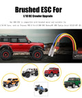 Waterproof 60A Brushed ESC for One Tenth Scale RC Crawlers and Trucks With T Plug Switch Mode BEC displayed with RC models