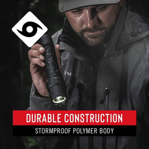 Man holding Polysteel 700 LED Flashlight 800 Lumens Heavy Duty Stainless Steel Core in rain with stormproof polymer body.