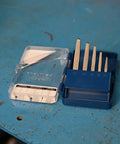 Six Piece Square Flute Screw Extractor Set For Removing Broken Screws And Bolts Without Damaging Threads Sizes 1 Through 6 displayed on table