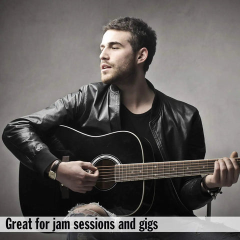Man playing guitar at jam session wearing Blackout Soft Foam Earplugs with 32 dB NRR, 7 Pairs Plus Travel Case.