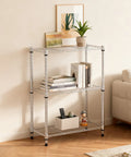 450 Lb Wire Storage Shelving Rack 3 Tier Steel Organizer For Home Kitchen Office Chrome Finish Sturdy Metal Shelving Unit 11.8 Inch Deep 17.7 Inch Wide 26.4 Inch High in living room with books and plant