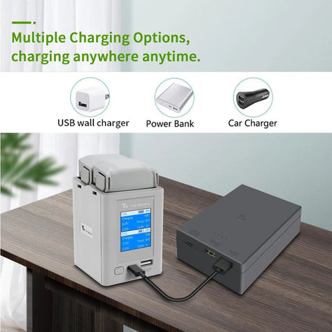 Two Way Battery Charging Hub For Mini 3 Pro Drone Batteries with Smart Power Display in gray, placed on a table
